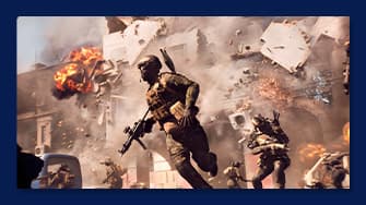 Screenshot aus dem Spiel Battlefield. Soldaten in Kampfausrüstung rennen durch ein vom Krieg zerstörtes Stadtgebiet, im Hintergrund sind Explosionen und Trümmer zu sehen.