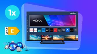 Flachbildfernseher mit Smart-TV-Funktion und Vidaa-Benutzeroberfläche mit Streaming-App-Symbolen auf blauem Farbverlaufshintergrund, Energielabel „E“ und „1x“-Symbol.