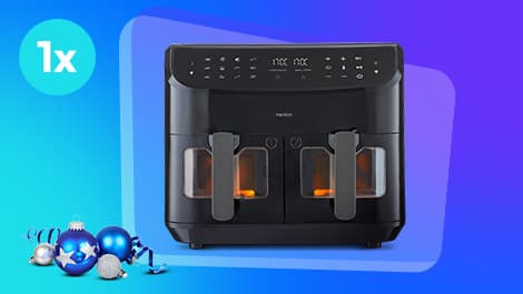 Schwarze Heißluftfritteuse mit zwei transparenten Schubladen, die den Blick auf orange beleuchtete Innenräume freigeben, auf blauem Farbverlaufshintergrund mit Ornamenten und dem Logo „1x“.