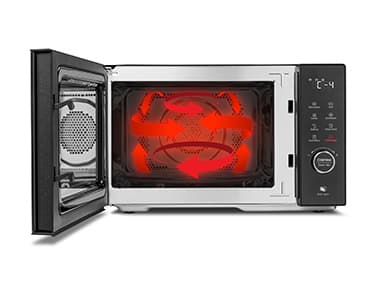 Offene Mikrowelle mit digitaler Steuerung, die im Inneren rote Pfeile zeigt, die die Konvektionswärmezirkulation anzeigen.